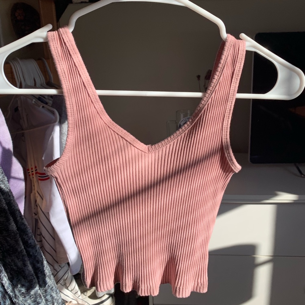Super stretchy little pink tank top👄